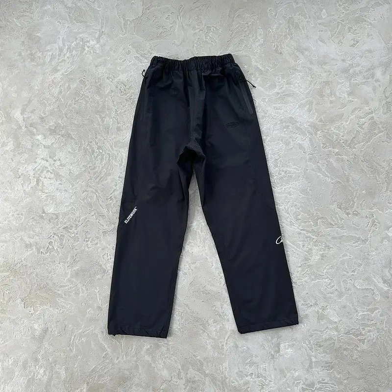 Corteiz Pink Windbreaker with Monogram on Sleeves — Black pants colorway — Joyagoo Spreadsheet photo