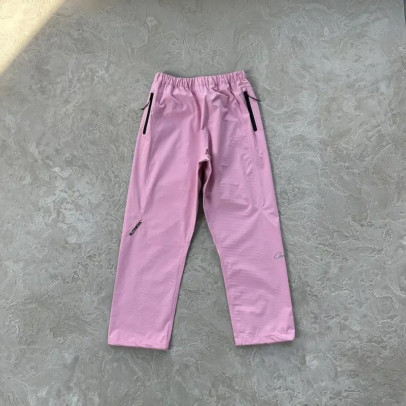 Corteiz Pink Windbreaker with Monogram on Sleeves — Pink pants colorway — Joyagoo Spreadsheet photo